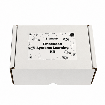 A white cardboard box with a printed label reading 'North Star Embedded Systems Kit' on a clean white background.